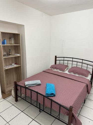Postel nebo postele na pokoji v ubytování AZUR HOTEL