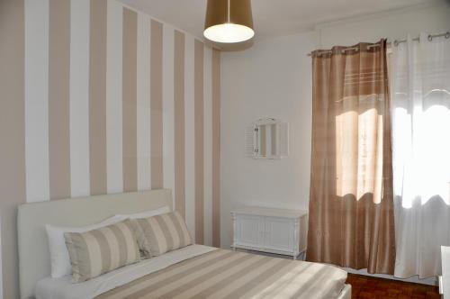 Кровать или кровати в номере M.Aurelio (Nolo) Light Brown