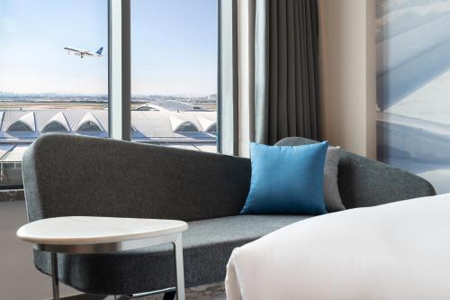 Гостиная зона в Novotel Guangzhou Baiyun Airport - Canton Fair Free Shuttle Bus & Official Registration Agency