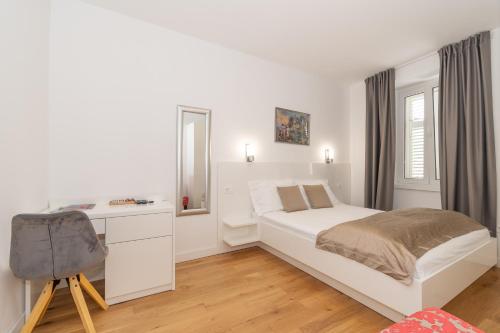 Postel nebo postele na pokoji v ubytování IL Cetro Spalato Rooms