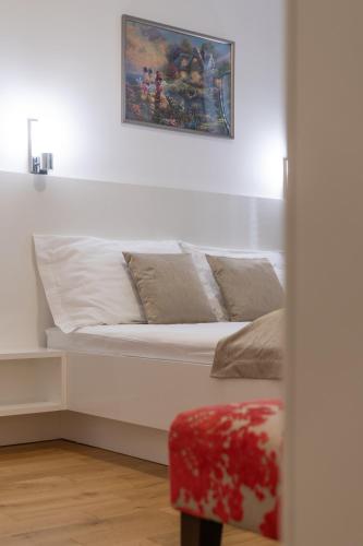 En eller flere senge i et værelse på IL Cetro Spalato Rooms