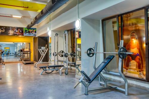 a gym with two treadmills and two machines at Asteria Family Resort Belek in Belek