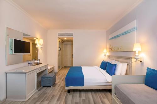 Ένα ή περισσότερα κρεβάτια σε δωμάτιο στο Selectum Collection Bodrum
