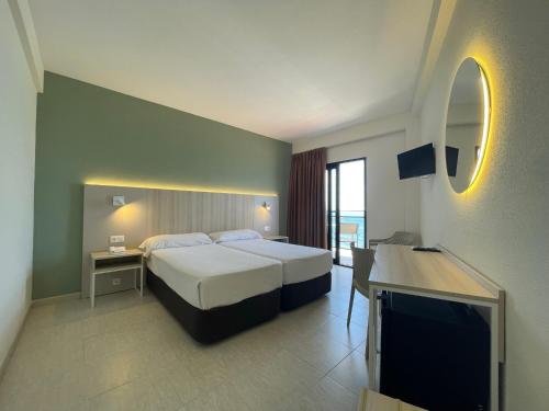 Katil atau katil-katil dalam bilik di Hotel Marconi