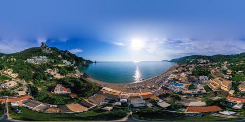 an aerial view of a town next to the ocean at Elena's Seaside Apartments & Studios in Agios Gordios