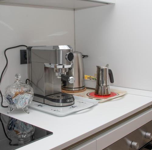 a coffee maker on a counter in a kitchen at Casa Valentin in Monforte dʼAlba