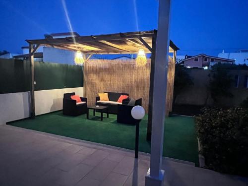 Posezení v ubytování Holiday House Villa AleGiù Marzamemi