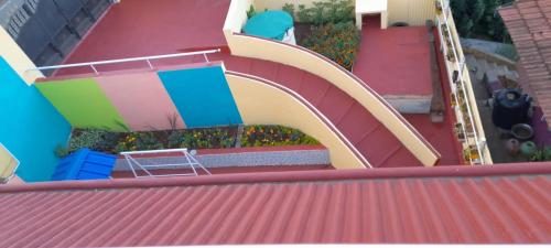 a slide on the roof of a house at Shanthi Villa in Coonoor
