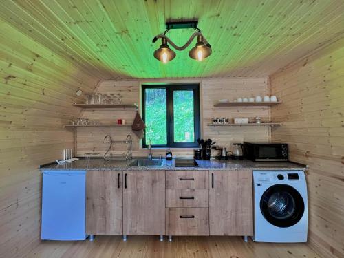 Kuchyň nebo kuchyňský kout v ubytování Sno Woodland