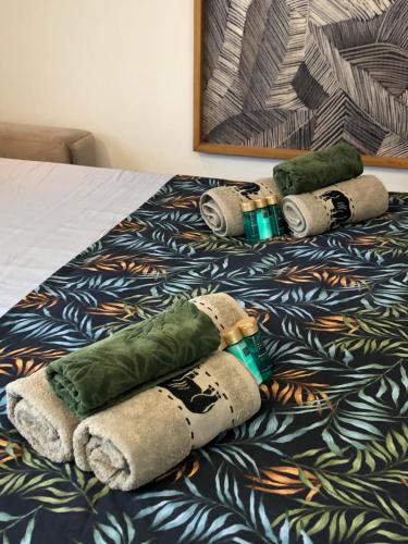 two rolled up towels on a bed at Omis - nice studio apartmant for 2, balcony, sun and beach in Omiš