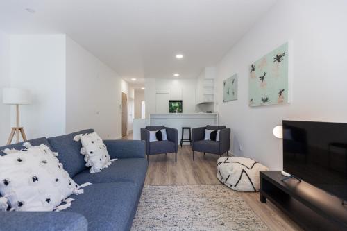 Posezení v ubytování FLH Penha França Art Apartment