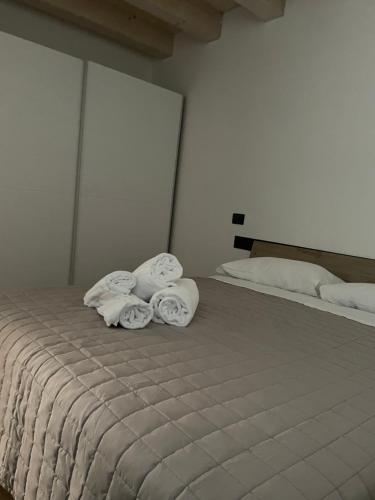 Giường trong phòng chung tại Residenza Rosy
