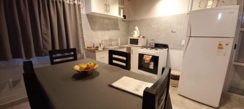 Η κουζίνα ή μικρή κουζίνα στο Departamento familiar