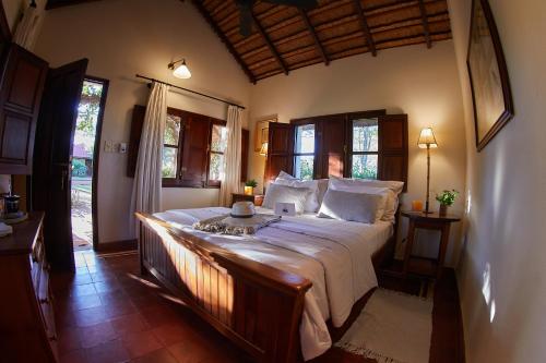 A bed or beds in a room at Rincón del Socorro