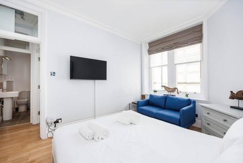 Ένα ή περισσότερα κρεβάτια σε δωμάτιο στο Charing Cross Road One Bedroom