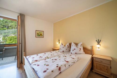 Postel nebo postele na pokoji v ubytování Langstein Wohnung Sonnenblume
