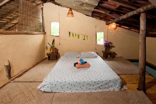 um quarto grande com duas camas num edifício em Canto do Morere em Morere