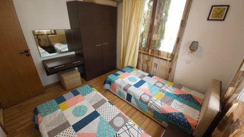 מיטה או מיטות בחדר ב-Complex Top Apartment