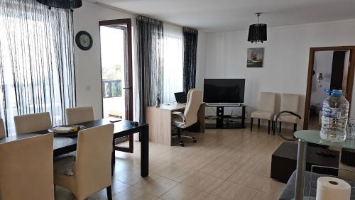Complex Top Apartment tesisinde bir televizyon ve/veya eğlence merkezi