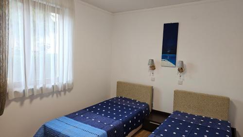 Posteľ alebo postele v izbe v ubytovaní Complex Top Apartment