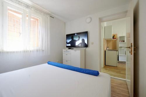 Cama ou camas em um quarto em Apartments Lea