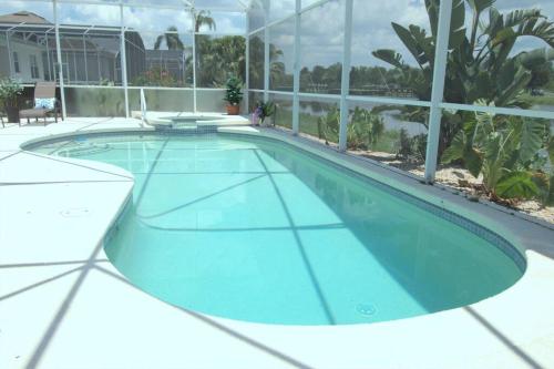 Entire home with pool and lake view and Golf course by Disney photo 11