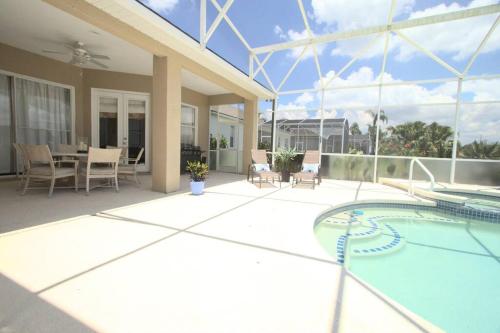 Entire home with pool and lake view and Golf course by Disney photo 43