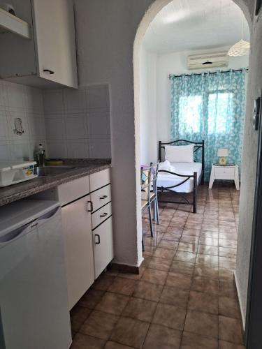 Kuchyň nebo kuchyňský kout v ubytování Βig Βlue Apartments
