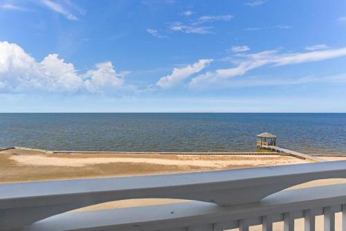 a view of the ocean from a balcony at RSR3C - Sunsets Galore in Rodanthe