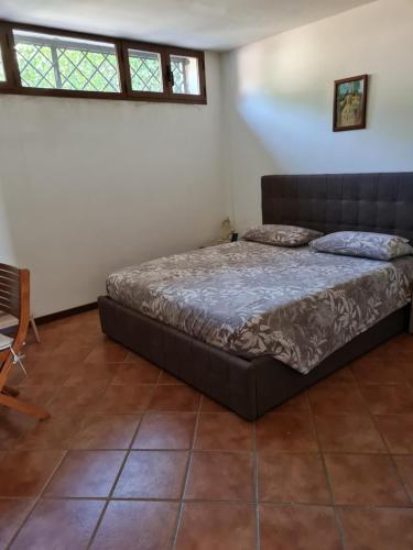 Ένα ή περισσότερα κρεβάτια σε δωμάτιο στο Come A Casa Tua
