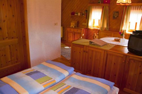 Posteľ alebo postele v izbe v ubytovaní Schrunerhof