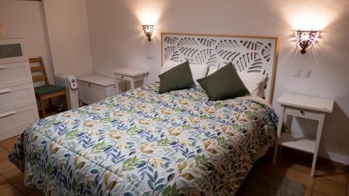 Giường trong phòng chung tại La Casa de la Lobita