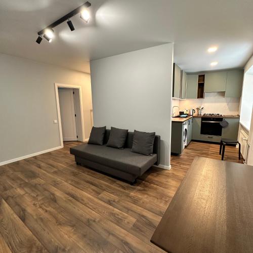 Kuchyň nebo kuchyňský kout v ubytování Cozy Apartment Kazlų Rūda