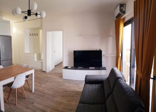 Μια τηλεόραση ή/και κέντρο ψυχαγωγίας στο Eman