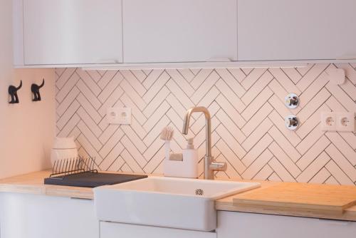 Η κουζίνα ή μικρή κουζίνα στο Apartamento Praia Buarcos