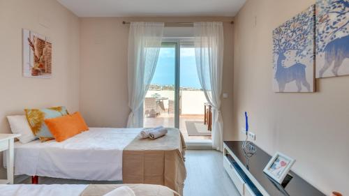Ένα ή περισσότερα κρεβάτια σε δωμάτιο στο huge penthouse seaviews gateaway