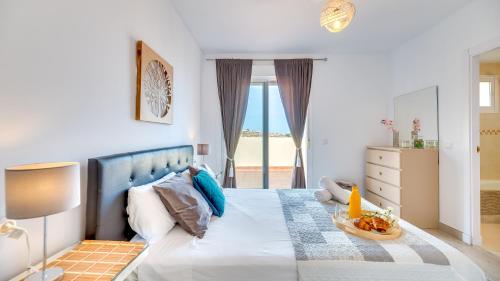 Ένα ή περισσότερα κρεβάτια σε δωμάτιο στο huge penthouse seaviews gateaway