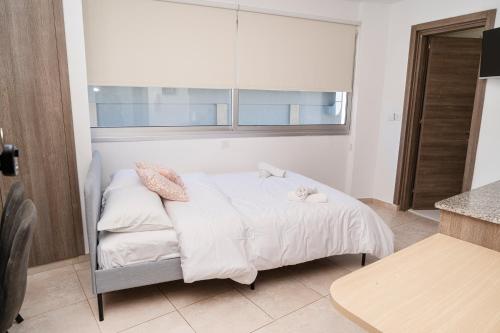 Cama o camas de una habitación en Appartments in the historic center near beach