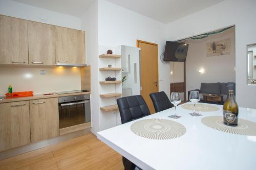 Kuchyň nebo kuchyňský kout v ubytování Apartment Adria Split