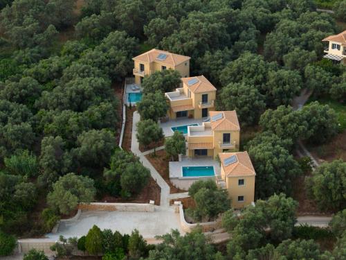 an aerial view of a house in the woods at Saitia Villette in Lefkada Town