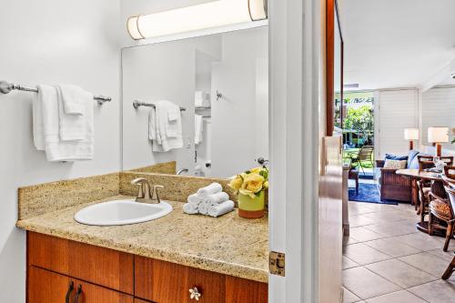 a bathroom with a sink and a mirror at Napili Shores F150 in Napili-Honokowai