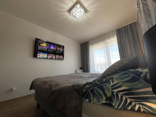 TV a/nebo společenská místnost v ubytování Apartament MK Aparts Dziwnów