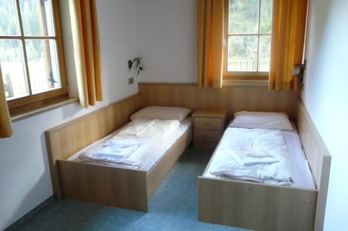 Posteľ alebo postele v izbe v ubytovaní Hotel Larchhof Ratschings