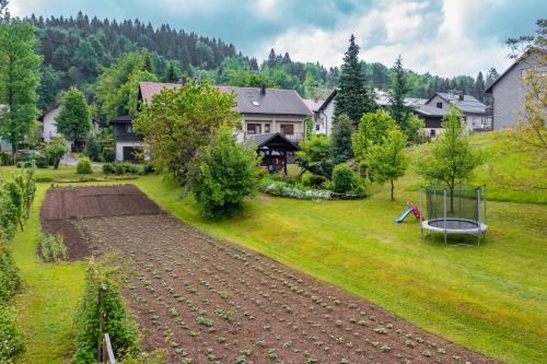 Zahrada ubytování Apartmani Gruzdovo