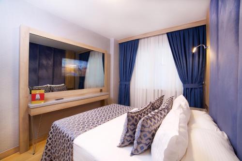 Postel nebo postele na pokoji v ubytování Aspen Hotel & SPA Istanbul Old City