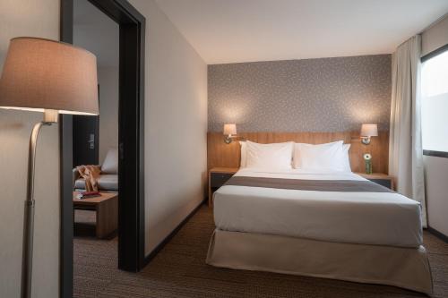 Postel nebo postele na pokoji v ubytování Like Design Hotel Rivera