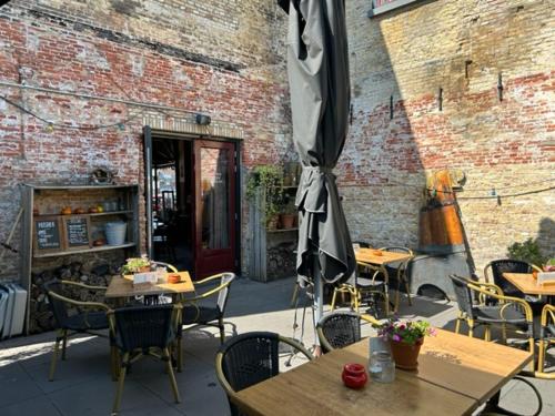 Restaurant ou autre lieu de restauration dans l'établissement Hotel Stadsherberg Sneek