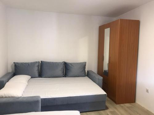 Postel nebo postele na pokoji v ubytování Mondeno apartments