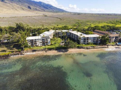 an aerial view of a resort on a beach at Kanai A Nalu 210 in Wailuku