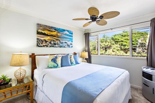 Postel nebo postele na pokoji v ubytování Maui Sands 2F